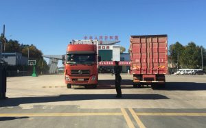 Trucks cross the Hunchun border crossing. -- China-North Korea border