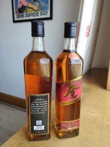 North Korean Whiskey | North Korea's new 'Samilpo' whiskey -- black label on the left and red label on the right.