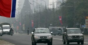 North Korean cars driving through Pyongyang