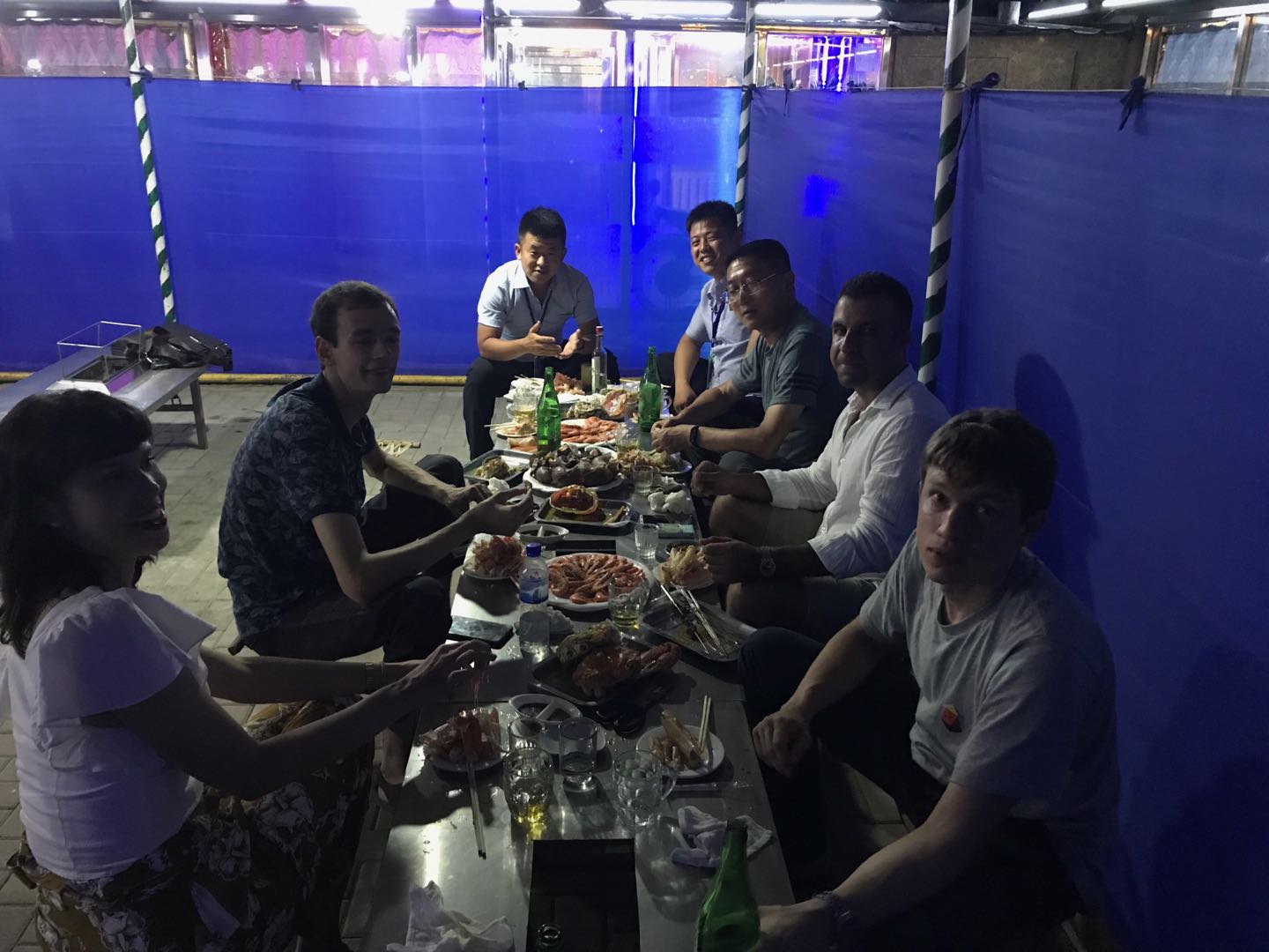 Rason: eating seafood at the local BBQ.