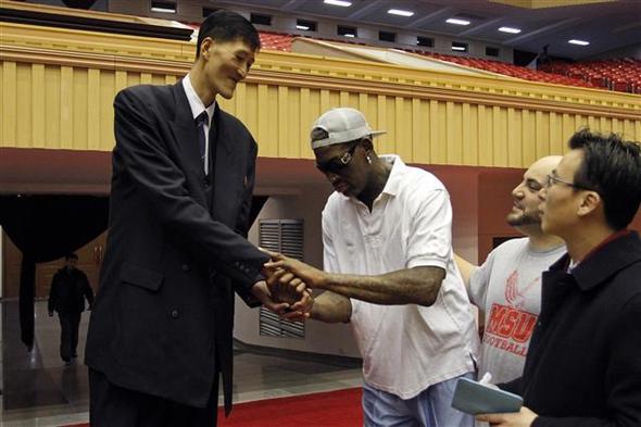 Ri Myung Hun, perhaps one of the most famous present-day North Korean celebrities, shakes hands with Dennis Rodman.
