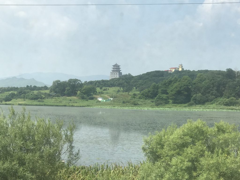 Russia-DPRK-China tripoint, with the Tumen pagoda across the river.