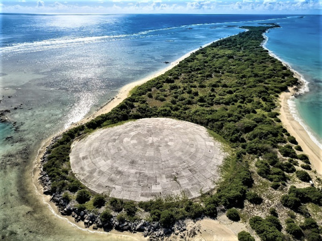 Worst islands: an overhead shot of the protective concrete dome placed over a heavily irradiated area of Enewetak Atoll, Marshall Islands.