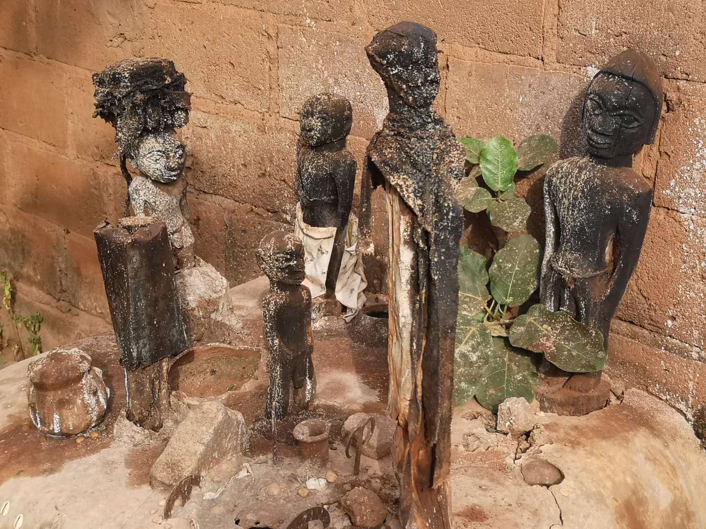 Different statues of voodoo gods